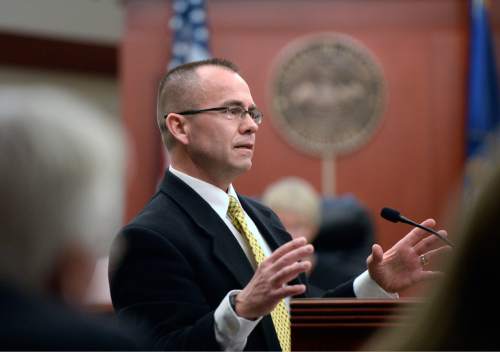 Al Hartmann  |  The Salt Lake Tribune
Prosecutor Tim Taylor makes his opening arguments in during the trial of Marc Sessions Jenson and Stephen R. Jenson in Salt Lake City on Wednesday, January 14, 2015. The Jenson brothers are charged with defrauding investors in a luxury ski resort near Beaver, Utah.