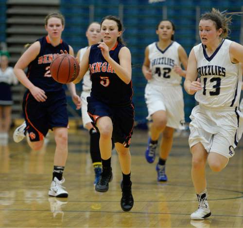 Francisco Kjolseth  |  The Salt Lake Tribune 
Brighton's Brooke Ingels is chased down by Copper Hills in the class 5A game as the No. 2-ranked teams battle it out at Copper Hills in West Jordan on Thursday night, Jan. 29, 2015.