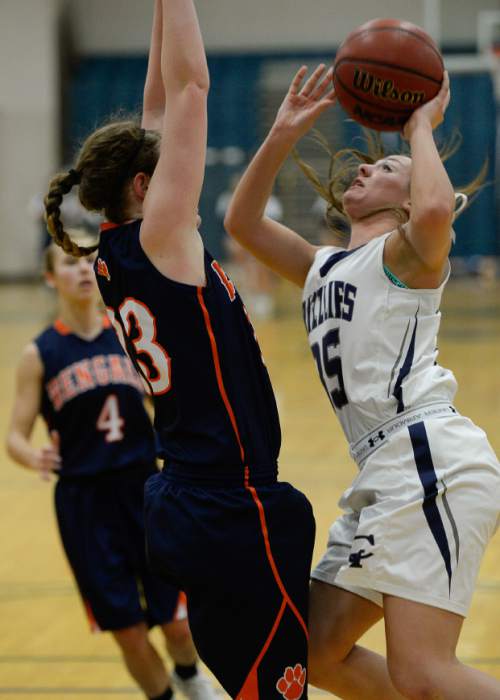 Francisco Kjolseth  |  The Salt Lake Tribune 
Shirsten Wissinger of Copper Hills, keeps her eye on the basket in the class 5A game as the No. 2-ranked teams battle it out at Copper Hills in West Jordan on Thursday night, Jan. 29, 2015.