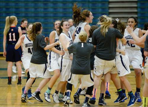 Francisco Kjolseth  |  The Salt Lake Tribune 
Copper Hills celebrates their win over Brighton following the class 5A No. 2-ranked battle at Copper Hills in West Jordan on Thursday night, Jan. 29, 2015.