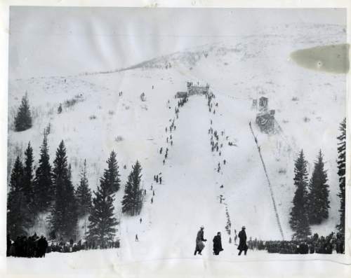 Tribune file photo

People watch the National Amateur Ski Tournament at Ecker Hill on Fe. 21, 1937. The venue was a world class ski jumping venue and hosted a number of high profile competitions in the 1930s and 1940s.