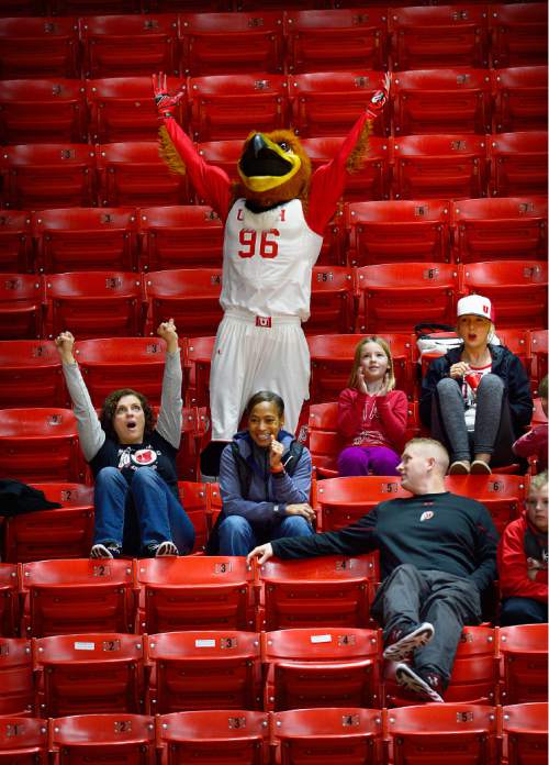 Scott Sommerdorf   |  The Salt Lake Tribune
Utah Utes mascot "Swoop" celebrated a Utah basket during first half play with some of the smattering of fans to see Arizona State beat Utah 58-48, Sunday, February 1, 2015.