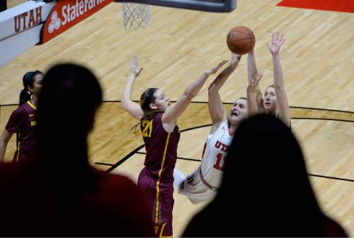 Scott Sommerdorf   |  The Salt Lake Tribune
Utah Utes forward Taryn Wicijowski (11) battles to get this shot off during first half play. Arizona State beat Utah 58-48, Sunday, February 1, 2015.