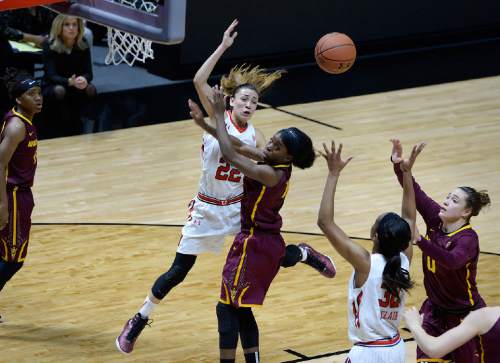 Scott Sommerdorf   |  The Salt Lake Tribune
Utah Utes guard Danielle Rodriguez (22) passes to Utah Utes forward Tanaeya Boclair (32) during this first half play. Arizona State beat Utah 58-48, Sunday, February 1, 2015.