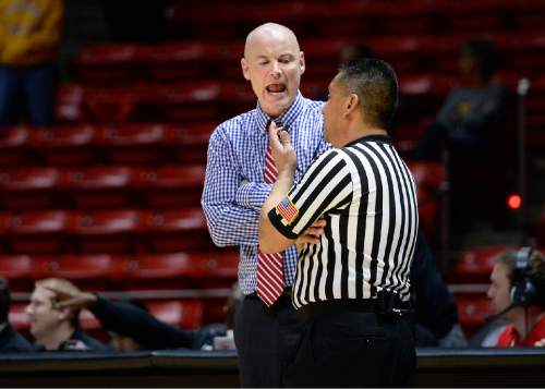 Scott Sommerdorf   |  The Salt Lake Tribune
Utah head coach Anthony Levrets has a discussion with a referee during a second half time out. Arizona State beat Utah 58-48, Sunday, February 1, 2015.