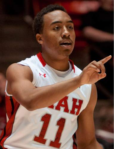 Michael Mangum  |  Special to the Tribune

Utah guard Brandon Taylor (11) calls an offensive play during their game against the Willamette Bearcats at the Huntsman Center on Friday, November 9, 2012. Utah led 52-22 after the first half.