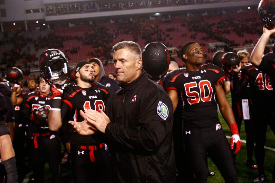 Chris Detrick  |  The Salt Lake Tribune
Utah Utes head coach Kyle Whittingham and his team after the game at Rice-Eccles Stadium Thursday October 3, 2013. UCLA won the game 34-27.