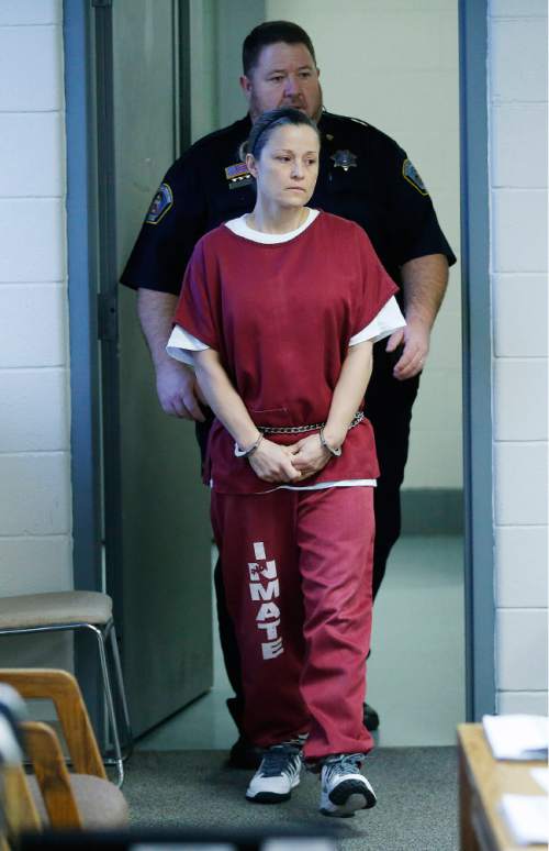 Jeffrey D. Allred Pool Photo Dea Millerberg enters for her parole hearing a...