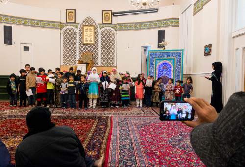 Trent Nelson  |  The Salt Lake Tribune
Children sing at the Alrasool Islamic Center in Taylorsville, Saturday January 10, 2015 as Shia Muslims celebrate the Prophet Muhammad's birthday.