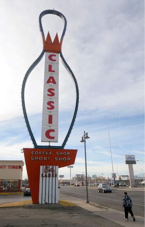 Al Hartmann  |  The Salt Lake Tribune
The iconic sign for AMF Ritz Classic Lanes still stands along 2265 S. State St. Thursday, Feb. 5, 2015, while salvage work goes on inside the 54-lane bowling alley. A sign on the alley's main entrarnce reads, "We're sorry to say that AMF Ritz Classic has closed. Thank you for your patronage and support over the years."