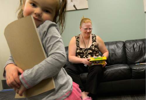 Leah Hogsten  |  The Salt Lake Tribune
Crystal Spencer smiles as her daughter Sandra Anderson, 4,  mugs for a picture. Spencer lives at the Volunteers of America Adult Detoxification Center,  one of the many service organizations in Utah that receive funding through the Pamela Atkinson Homeless Trust Fund and helps those in need of drug and alcohol recovery. Utahns have the opportunity to support the trust fund through donations on their tax form. All donations to the fund go directly to service organizations that provide vital services to individuals and families experiencing homelessness.