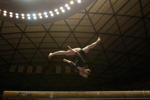 Utah's Annie DiLuzio performs a flip on the beam. She scored a 9.825.
Chris Detrick  |  The Salt Lake Tribune