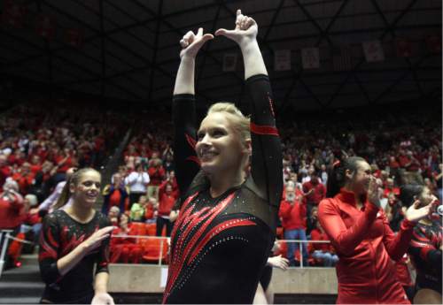 Kim Raff  |  The Salt Lake Tribune
Utah gymnast Georgia Dabritz celebrates with her teammates after  receiving a 10.00 for her routine on the uneven bars a during a meet against Florida at the Huntsman Center in Salt Lake City on March 16, 2013.