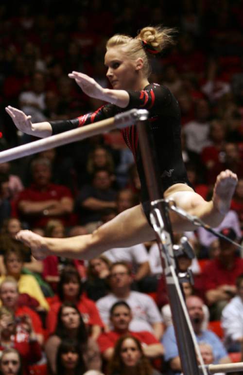 Kim Raff  |  The Salt Lake Tribune
Utah gymnast Georgia Dabritz performs on the uneven bars a during a meet against Florida at the Huntsman Center in Salt Lake City on March 16, 2013. She received a perfect 10 for her routine.