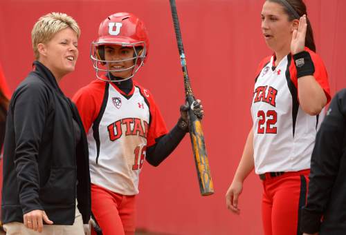 Leah Hogsten  |  The Salt Lake Tribune
Utah head coach Amy Hogue celebrates Trina Gomez's scoring run. University of Utah women's softball team defeated Southern Utah University 12-4 during their first game of a doubleheader, Tuesday, April 22, 2014.