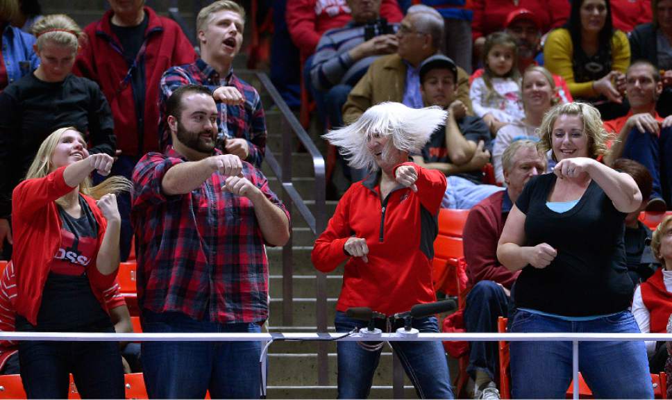 Leah Hogsten  |  The Salt Lake Tribune
The Crazy Lady and other gymnastic team fans dance during the meet. University of Utah women's gymnastics team defeated Arizona State, Friday, February 6, 2015.