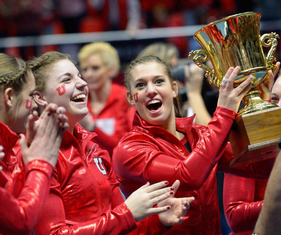 Leah Hogsten  |  The Salt Lake Tribune
University of Utah women's gymnastics team celebrates their win over Arizona State, Friday, February 6, 2015.