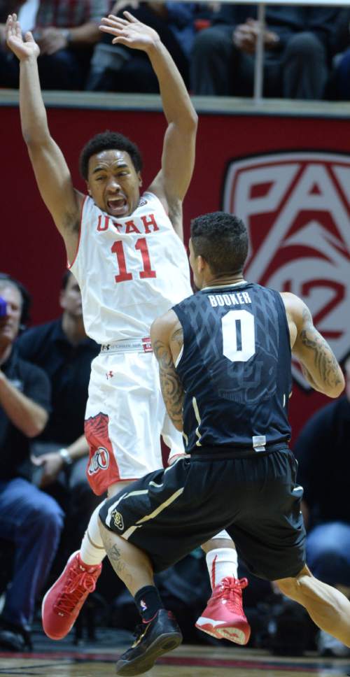 Steve Griffin  |  The Salt Lake Tribune


Utah Utes guard Brandon Taylor (11) flies backward as Colorado Buffaloes guard Askia Booker (0) drives into him during first half action in the Utah versus Colorado men's basketball game at the Huntsman Center in Salt Lake City, Wednesday, January 7, 2015.