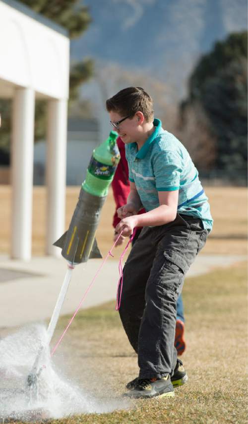 Rick Egan  |  The Salt Lake Tribune

Anson Wood launches a rocket during his science class at Lakeridge Jr. High, Thursday, February 5, 2015