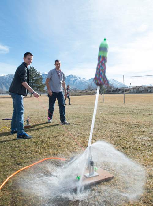 Rick Egan  |  The Salt Lake Tribune

Adam Hunsaker launches a rocket during his eighth-grade science class at Lakeridge Jr. High, Thursday, February 5, 2015