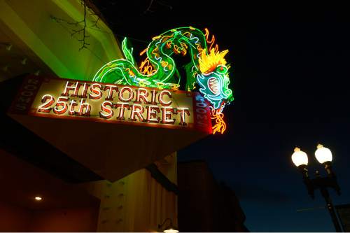 Leah Hogsten  |  The Salt Lake Tribune
The neon dragon sign that hung at the Star Noodle restaurant in Ogden for decades has been refurbished and was re-hung on Friday. The former Star Noodle dragon sign stood watch over 25th Street in Ogden for more than five decades. In 2008, the sign was taken down for the purpose of renovation. The sign is the original design built by YESCO in the 1950s with 250 feet of neon and 58 smaller lights. YESCO was contracted to refurbish the sign and the entire structure was completely sanded down to the original structure.