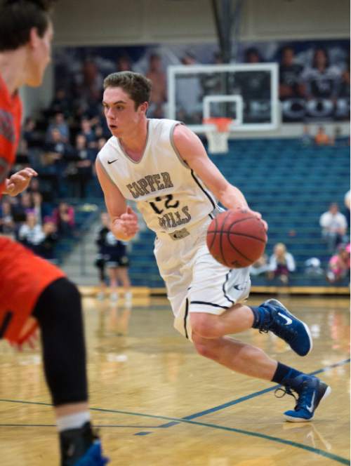 Steve Griffin  |  The Salt Lake Tribune

Copper Hills'  guard Stockton Shorts drives into the lane during game against Brighton at Copper Hills High School in West Jordan, Utah Tuesday, February 3, 2015.