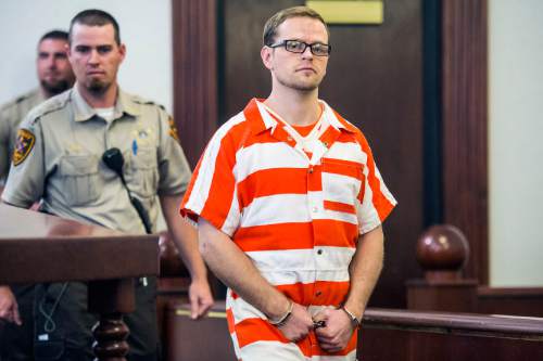 Chris Detrick  |  The Salt Lake Tribune
Logan Welles McFarland enters the courtroom during his initial hearing in 6th District Court in Manti on Wednesday. McFarland, 27, of Fairview, was charged last May in 6th District Court with two counts of aggravated murder ó a death penalty-eligible offense ó in the December 2011 slayings of 70-year-old Leroy Fullwood and his 69-year-old wife, Dorothy Ann Fullwood.