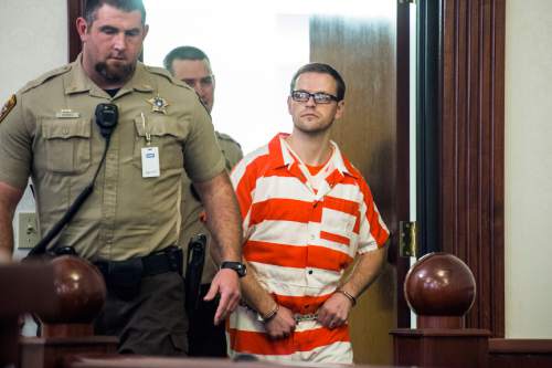 Chris Detrick  |  The Salt Lake Tribune
Logan Welles McFarland enters the courtroom during his initial hearing in 6th District Court in Manti Wednesday Feb. 11, 2015. McFarland, 27, of Fairview, was charged last May in 6th District Court with two counts of aggravated murder -- a death penalty-eligible offense -- in the December 2011 slayings of 70-year-old Leroy Fullwood and his 69-year-old wife, Dorothy Ann Fullwood.