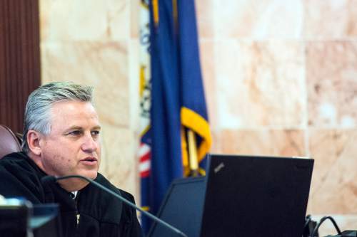 Chris Detrick  |  The Salt Lake Tribune
Judge Marvin Bagley speaks to Logan Welles McFarland during his initial hearing in 6th District Court in Manti Wednesday Feb. 11, 2015. McFarland, 27, of Fairview, was charged last May in 6th District Court with two counts of aggravated murder -- a death penalty-eligible offense -- in the December 2011 slayings of 70-year-old Leroy Fullwood and his 69-year-old wife, Dorothy Ann Fullwood.