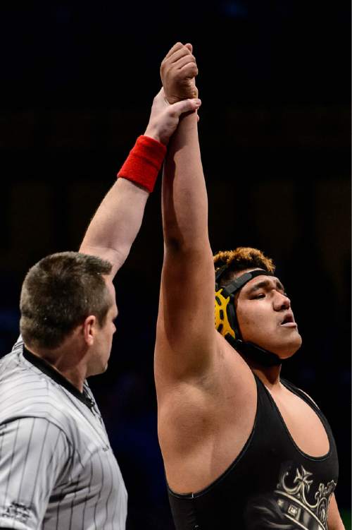 Trent Nelson  |  The Salt Lake Tribune
Damian Trujillo of Roy completed a perfect season after winning the 285 lb. 4A state championship wrestling match against Bes Bos of Wasatch, at Utah Valley University in Orem, Thursday February 12, 2015.
