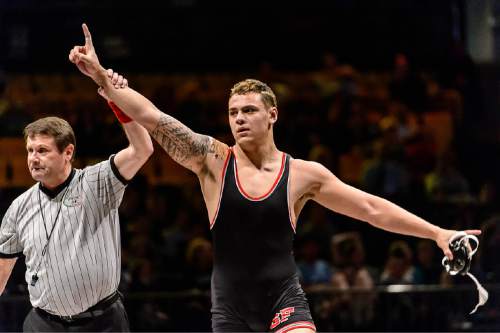 Trent Nelson  |  The Salt Lake Tribune
I. john Leilua of Spanish Fork celebrates his win in the 220 lb. 4A state championship wrestling match at Utah Valley University in Orem, Thursday February 12, 2015.