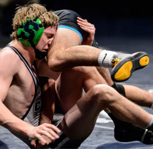 Trent Nelson  |  The Salt Lake Tribune
Colton Berger of Syracuse was defeated by Jacob Knapp of Cottonwood in the 126 lb. 5A state championship wrestling match at Utah Valley University in Orem, Thursday February 12, 2015.