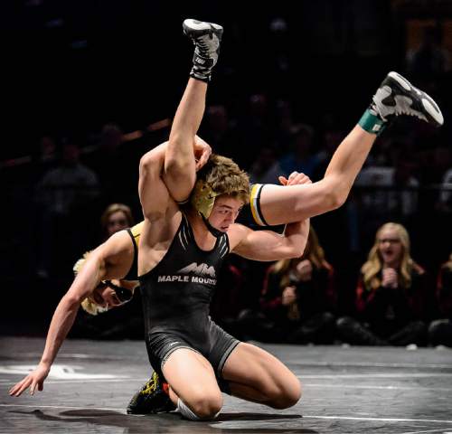Trent Nelson  |  The Salt Lake Tribune
Tanner Cox of Maple Mountain, right, defeated Corbin Smith of Wasatch in the 120 lb. 4A state championship wrestling match at Utah Valley University in Orem, Thursday February 12, 2015.