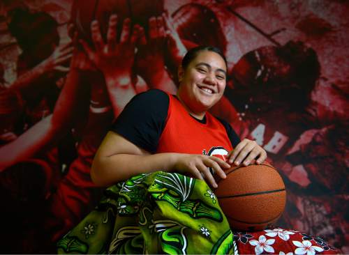 Leah Hogsten  |  The Salt Lake Tribune
Utah freshman center Joeseta Fatuesi, 19, has been asked to play a big role in her first season with the Utes, and she will do the same as the daughter of a Samoan High Talking Chief. Fatuesi is pictured with her puletasi dress she wears for special occasions.
