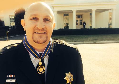 Thomas Burr  |  The Salt Lake Tribune 

Weber County Sheriff's Lt. Nathan Hutchinson was awarded the Medal of Valor by Vice President Joe Biden on Wednesday at the White House for his efforts to save fellow officers during a 2012 drug raid in Ogden.
The medal is the nation's highest award for law Enforcement officers.