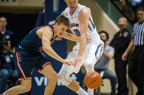 Chris Detrick  |  The Salt Lake Tribune
Brigham Young Cougars guard Chase Fischer (1) guards St. Mary's Gaels guard Emmett Naar (41) during the game at the Marriott Center Thursday February 12, 2015.