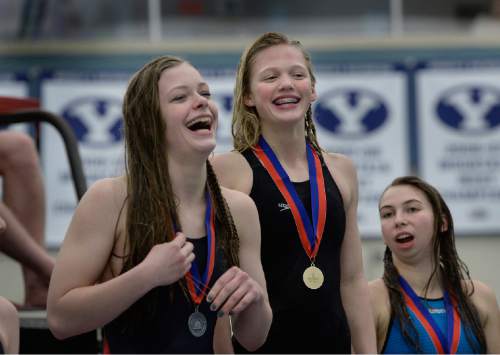 Scott Sommerdorf   |  The Salt Lake Tribune
Winner of the Girl's 100 breaststroke, Blaire McDowell, right celebrates with 2nd place finisher Joelle Hess at the 3A Utah State Swimming Championships, Saturday, February 14, 2015. Both girls swim for Park City High, and helped in the school's domination of the meet.