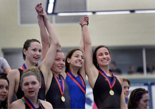 Scott Sommerdorf   |  The Salt Lake Tribune
The Park City Girls 400 yard freestyle relay team celebrates their first place finish and a new state record of 3:37.67 at the 3A Utah State Swimming Championships, Saturday, February 14, 2015.