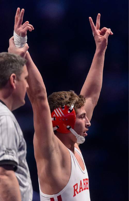 Trent Nelson  |  The Salt Lake Tribune
Victor Almanza, Delta, celebrates his win over Tyler Gamble, Millard, in the 2A, 160lb championship match at the state wrestling championships in Orem, Saturday February 14, 2015.