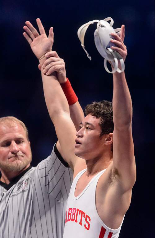 Trent Nelson  |  The Salt Lake Tribune
Trace Willoughby, Delta, celebrates his win over Tyce Raddon, Beaver, in the 2A, 145lb championship match at the state wrestling championships in Orem, Saturday February 14, 2015.