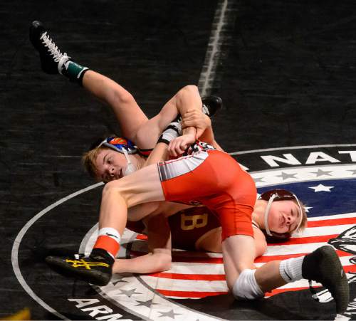 Trent Nelson  |  The Salt Lake Tribune
Gentry Warner, Juab, right, faces Holden Richards, Bear River, in the 3A, 106lb championship match at the state wrestling championships in Orem, Saturday February 14, 2015.