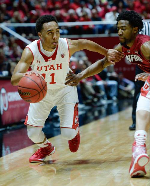 Francisco Kjolseth  |  The Salt Lake Tribune 
Brandon Taylor drives the ball against Stanford in game action on Thursday, Feb. 12, 2015, at the Huntsman Center at the University of Utah.