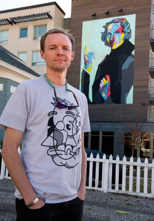 Rick Egan  |  The Salt Lake Tribune

Artist Chuck Landvatter in front the mural at the new North Sixth apartment complex, Wednesday, Feb. 11, 2015. The mural features a likeness of Thelma McDonald, a fixture in the neighborhood, taken from a family photo.