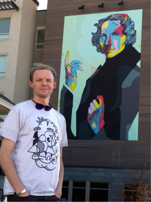 Rick Egan  |  The Salt Lake Tribune

Artist Chuck Landvatter in front the mural at the new North Sixth apartment complex, Wednesday, Feb. 11, 2015. The mural features a likeness of Thelma McDonald, a fixture in the neighborhood, taken from a family photo.