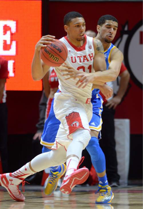 Steve Griffin  |  The Salt Lake Tribune


Utah Utes forward Jordan Loveridge (21) drives past UCLA Bruins guard Noah Allen (22) during first half action in the Utah versus UCLA men's basketball game at the Huntsman Center in Salt Lake City, Sunday, January 4, 2015.