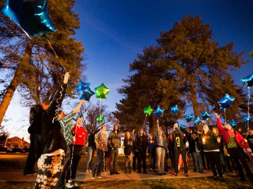 Rick Egan  |  The Salt Lake Tribune

Friends and family release balloons, in memory of Cody Evans, 24, who was fatally shot by police Sunday night, at Pioneer Park in Provo, Monday, February 16, 2015