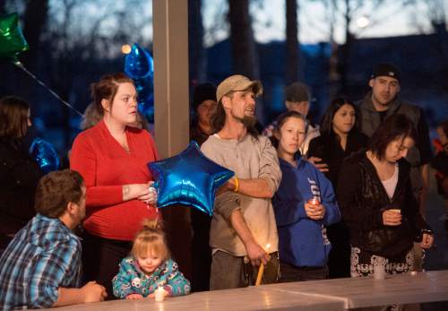 Rick Egan  |  The Salt Lake Tribune

Friends and family share memories of Cody Evans, 24, of Springville, during a candle-light vigil, Monday, February 16, 201. Evans was fatally shot by police Sunday night.
