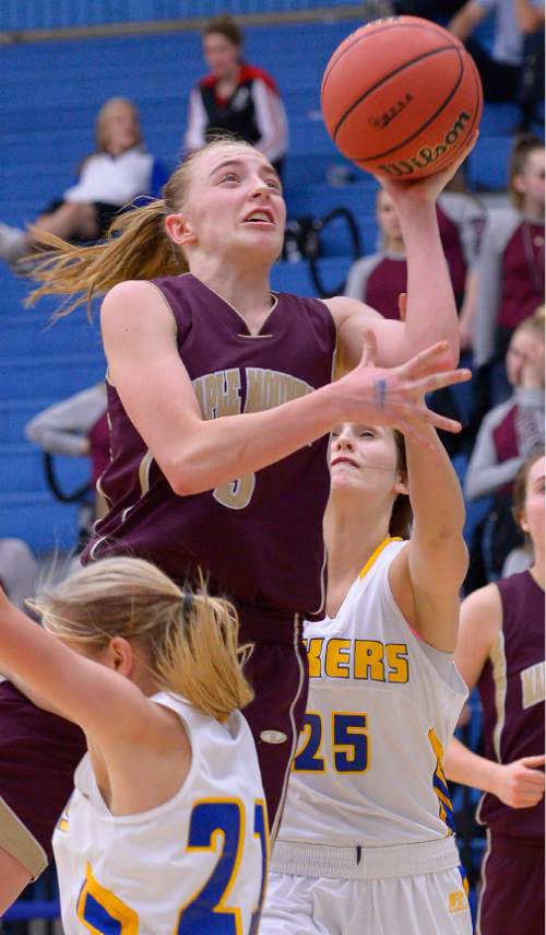 Leah Hogsten  |  The Salt Lake Tribune
Maple Mountain's Liz Eaton drives to the net. Maple Mountain High School girls basketball team defeated Bonneville High School 55-44 during the 4A State Championships first round game, Tuesday, February 17, 2015 at Salt Lake Community College's Lifetime Activities Center .