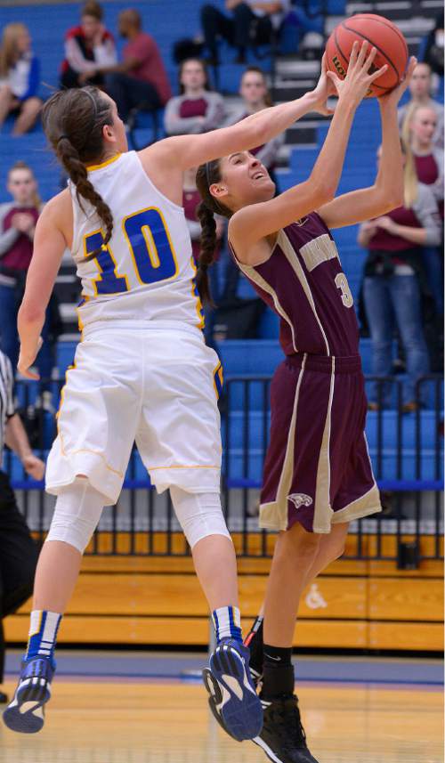 Leah Hogsten  |  The Salt Lake Tribune
Maple Mountain's Nicole Heyn is fouled by Bonneville's Hannah Shore. Maple Mountain High School girls basketball team defeated Bonneville High School 55-44 during the 4A State Championships first round game, Tuesday, February 17, 2015 at Salt Lake Community College's Lifetime Activities Center .