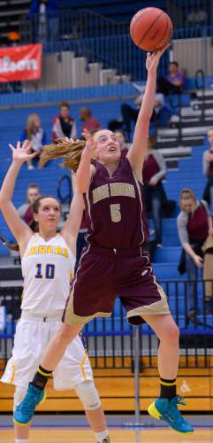 Leah Hogsten  |  The Salt Lake Tribune
Maple Mountain's Liz Eaton hits the rim.  Maple Mountain High School girls basketball team defeated Bonneville High School 55-44 during the 4A State Championships first round game, Tuesday, February 17, 2015 at Salt Lake Community College's Lifetime Activities Center .